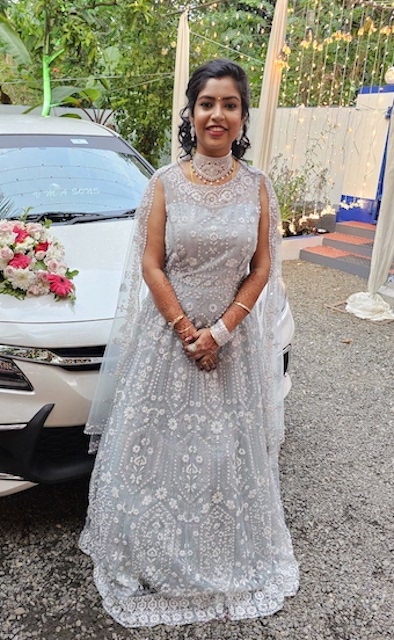 bride wearing gown for her wedding reception